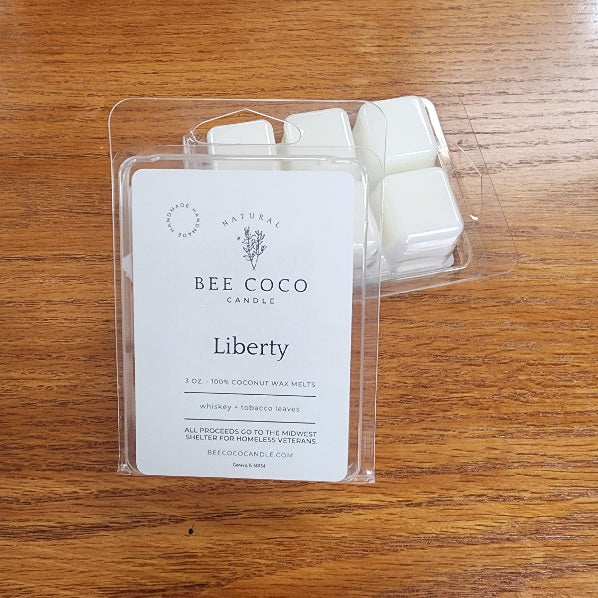 Bee Coco Candle wax melts packaging on a wooden surface