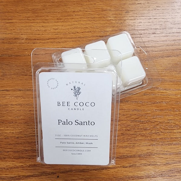 Pack of Bee Coco Palo Santo wax melts on a wooden surface