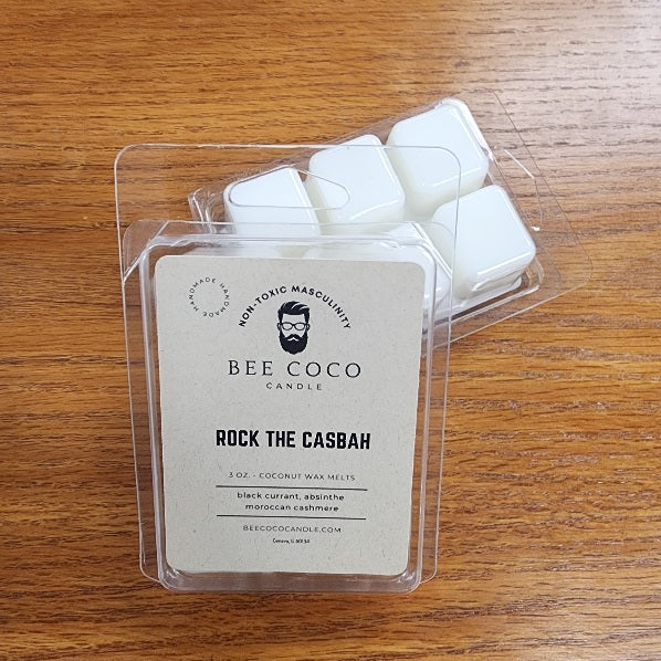 Bee Coco Candle wax melts in packaging on a wooden surface