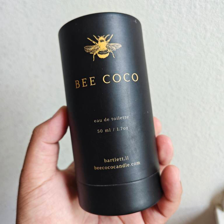 Bee Coco eau de toilette Box in mans hand