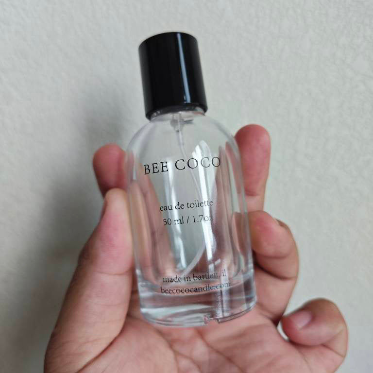 Bee Coco eau de toilette bottle in hand