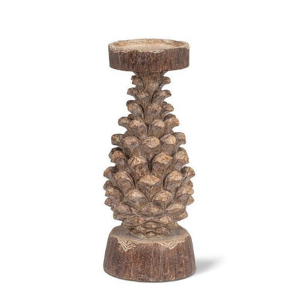 A pinecone-shaped pillar candle holder made of resin, with a rustic brown finish.