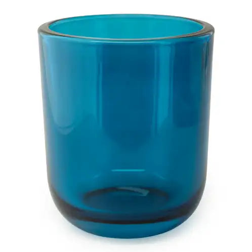 Blue glass tumbler on a white background