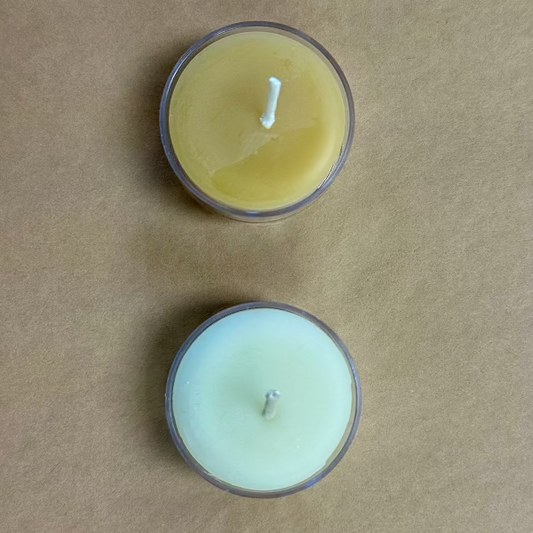 overhead shot of beeswax tea lights