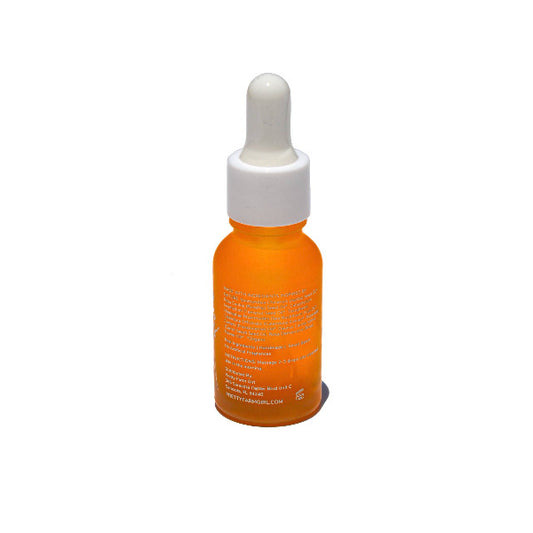 Orange dropper bottle with white cap on a white background