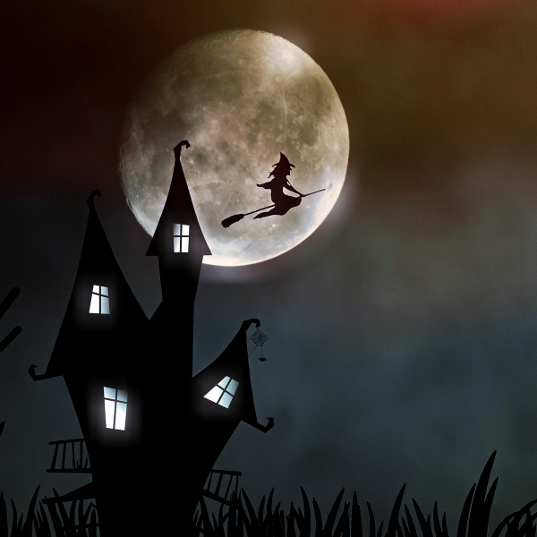 spooky house with witch flying in front of moon Jesus is Lord
