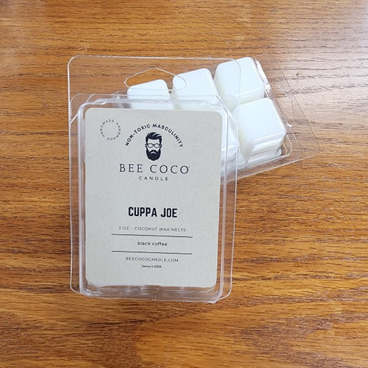 Pack of Bee Coco Candle wax melts on a wooden surface