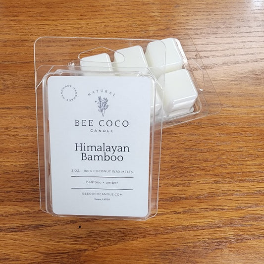Pack of Bee Coco Himalayan Bamboo wax melts on a wooden surface