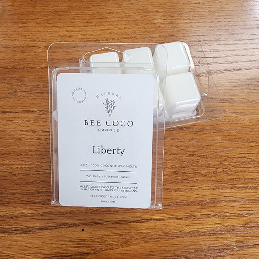 Bee Coco Candle wax melts packaging on a wooden surface