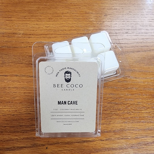Bee Coco candle wax melts in packaging on a wooden surface