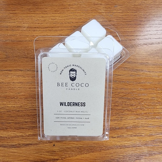 Pack of Bee Coco Candle wax melts on a wooden surface