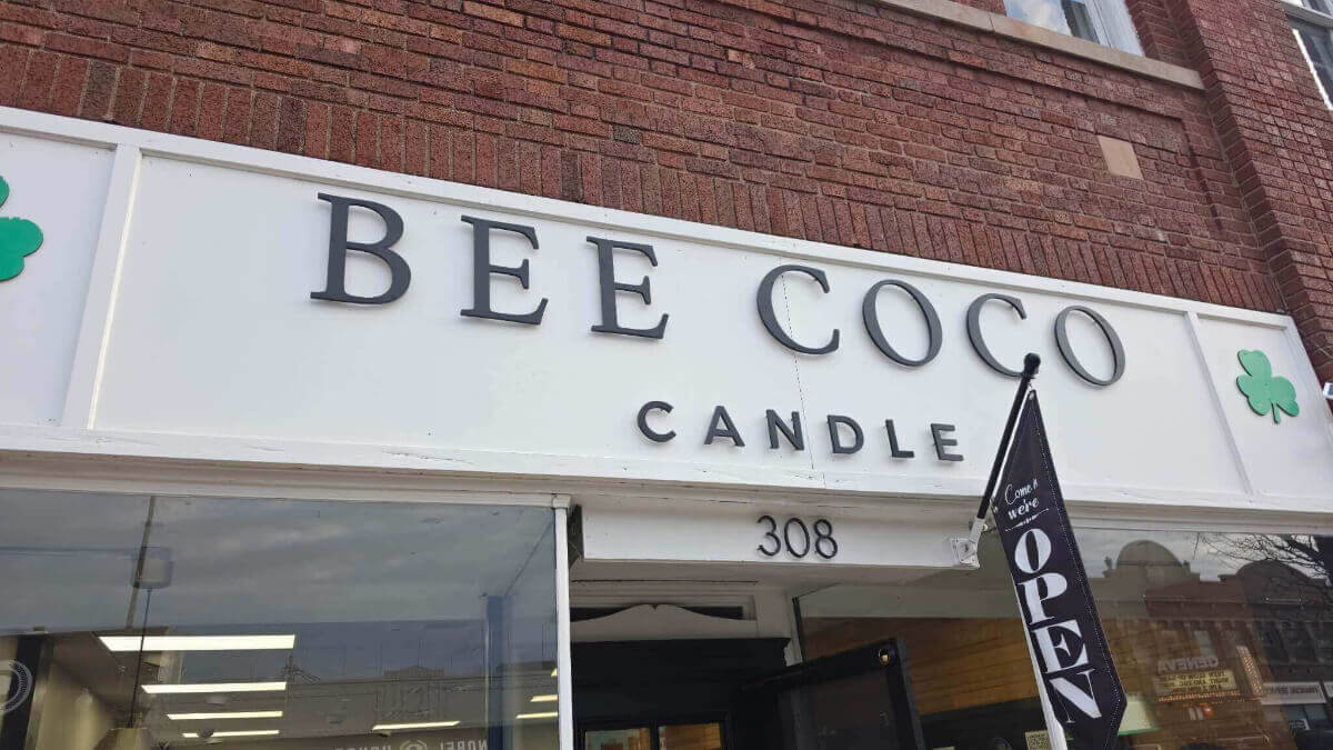 Bee Coco Candle Outside of Building