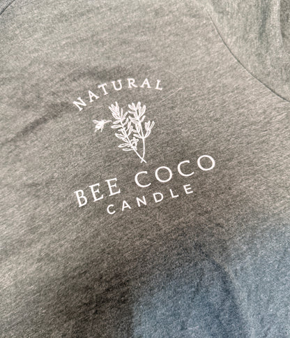 heathered green tee with 'Bee Coco Candle' logo printed on front chest pocket area