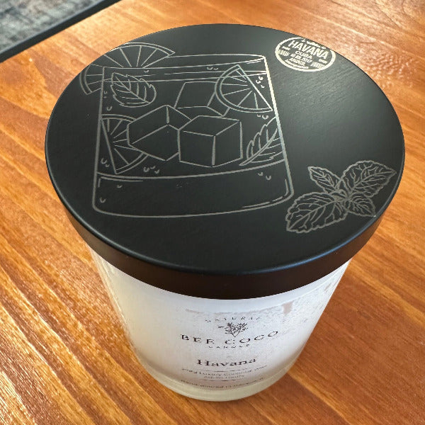 Bee & Coco Havana candle on a wooden surface