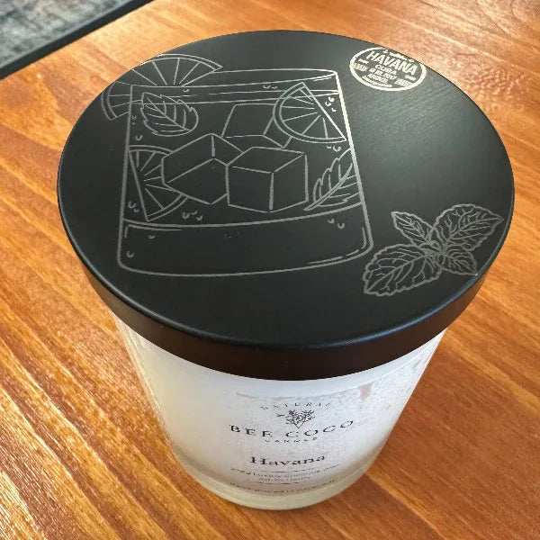 Bee & Coco Havana candle on a wooden surface
