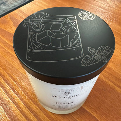 Bee & Coco Havana candle on a wooden surface