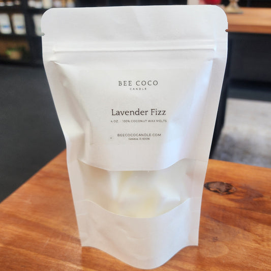 Bee Coco Lavender Fizz product packaging on a wooden surface