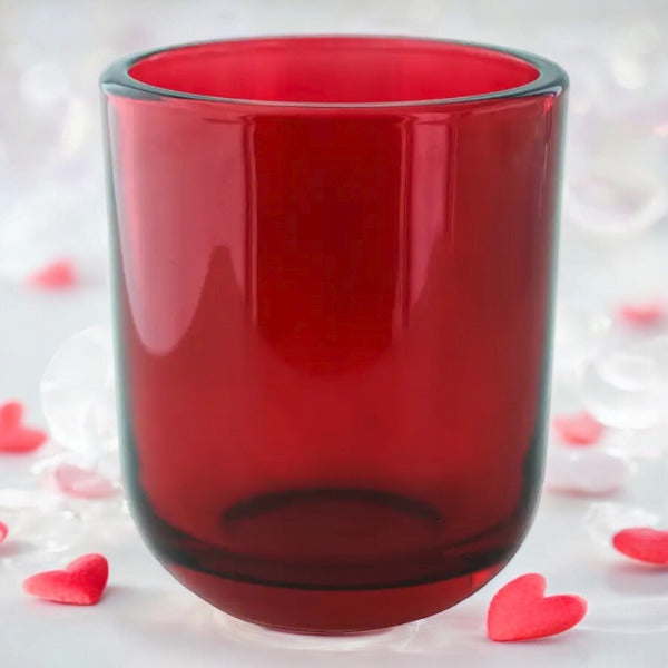 red glass empty candle jar