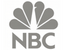 NBC peacock logo in gray on a white background.