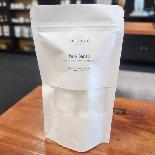 White product packaging on a wooden surface with a blurred background